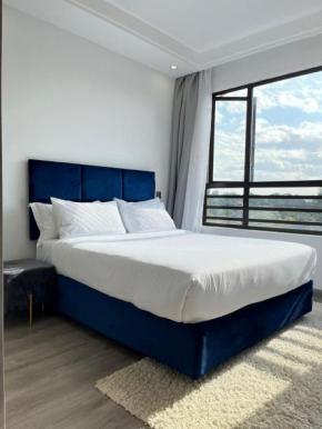 modern luxury two bedroom apartment with heated swimming pool fully equipped gym ample parking space child play area and amazing city views